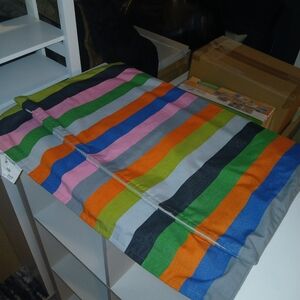 Three matching 20"x20" multi-color IKEA pillow covers with zippered closure